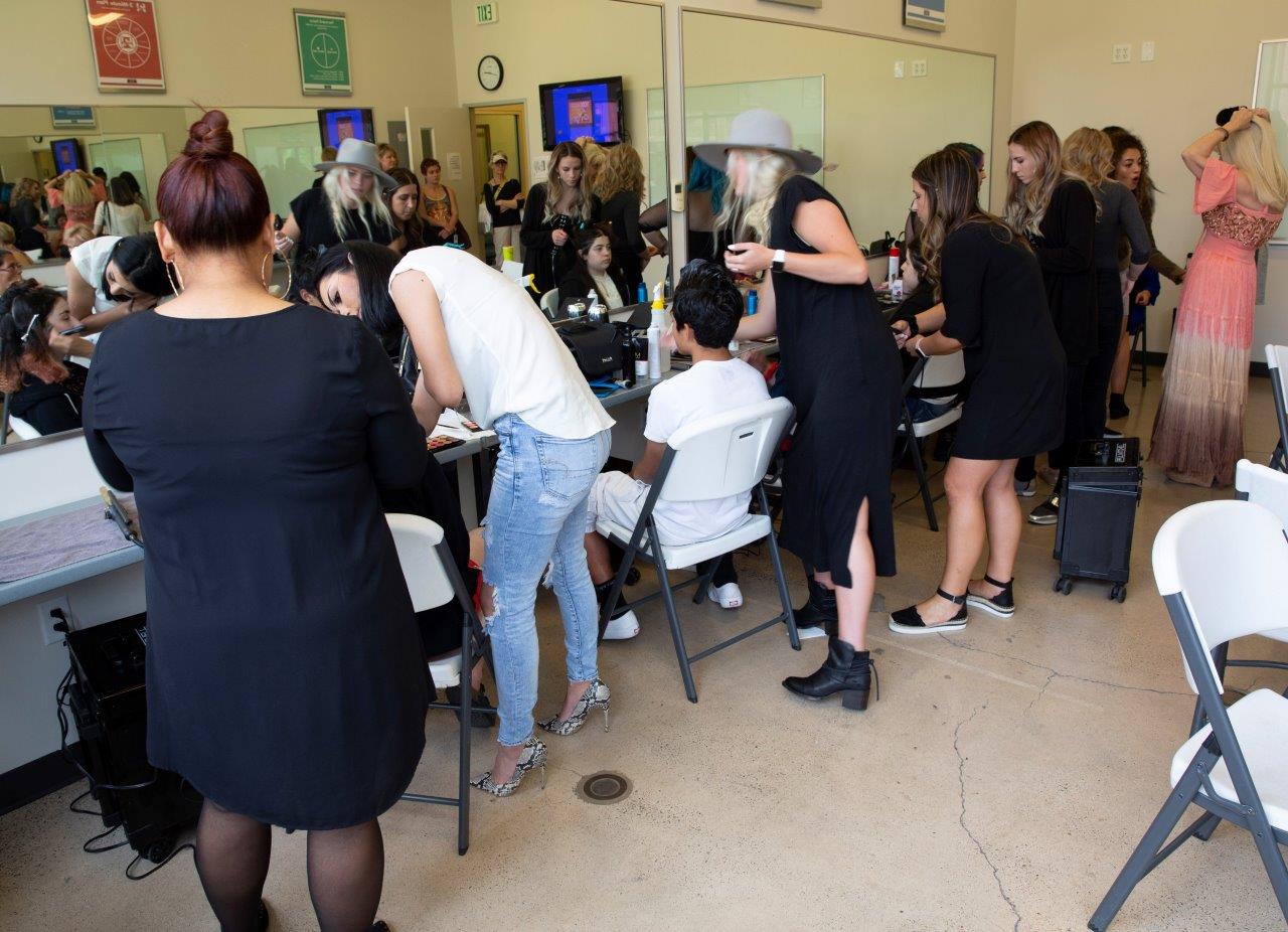 Paul Mitchell The School - students donate time and efforts with models